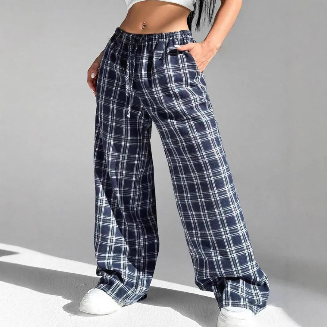 Women's loose plaid trousers with drawstring waist and pockets in red or blue colour options