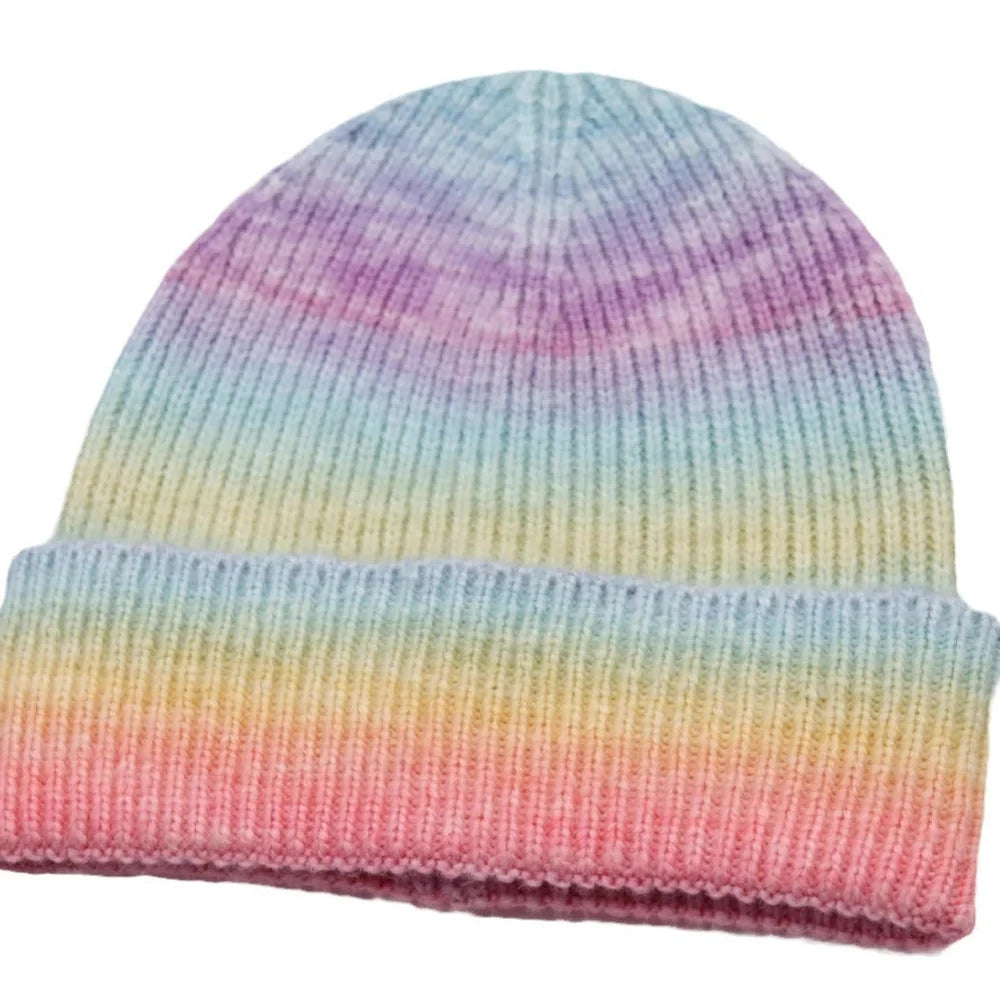 Gradient yarn knitted hat with tapered top in light blue colour showing knitted texture