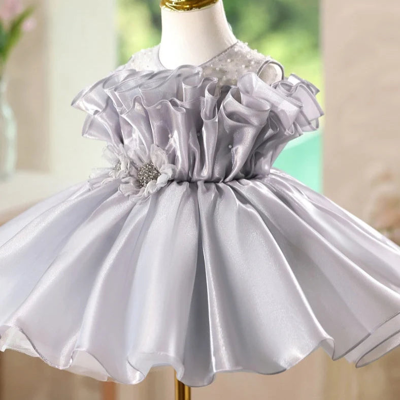 A sleeveless princess dress for girls' birthday banquets, made from 100% polyester fabric in a slim fit design with round neckline and short length, available in eight sizes from 90cm to 160cm and a smoky grey colour.