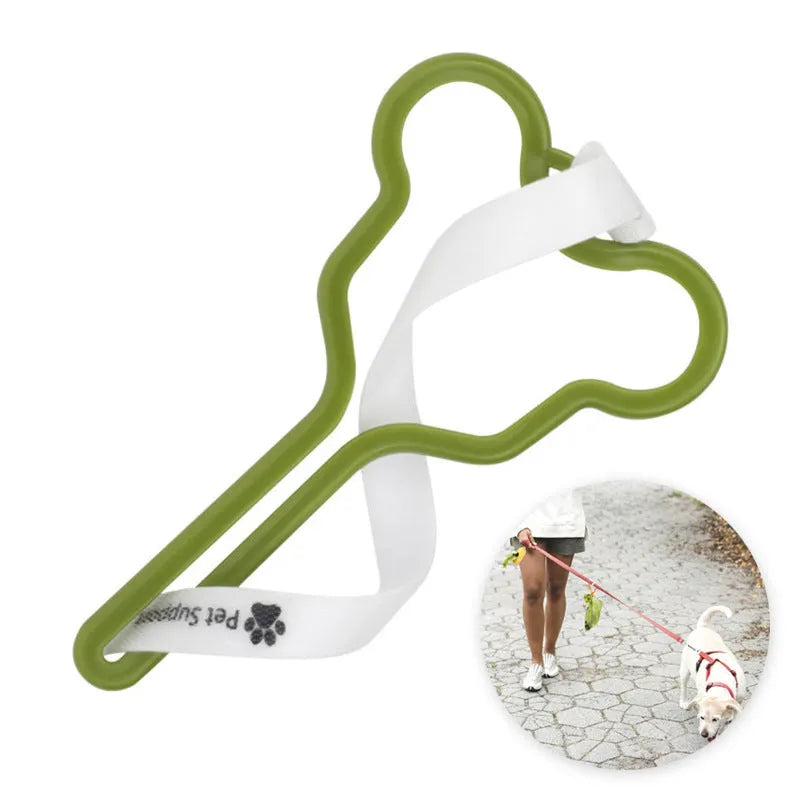 A dog poop bag dispenser with a hands-free clip and adjustable Velcro strap attached to a dog lead.