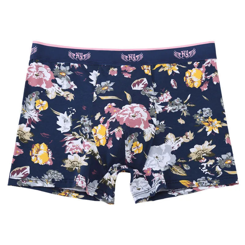 Men's cotton boxer briefs on a size chart showing weights for 3XL to 10XL, in floral colour options.