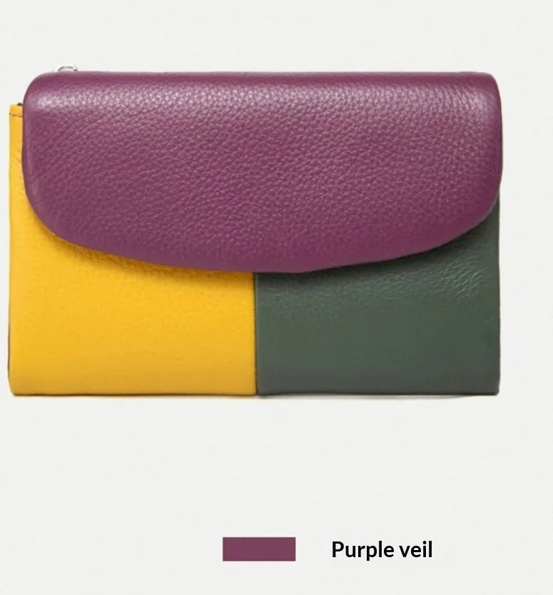 Women's short wallet in soft leather texture with solid colour and stitching detail, urban minimalist style