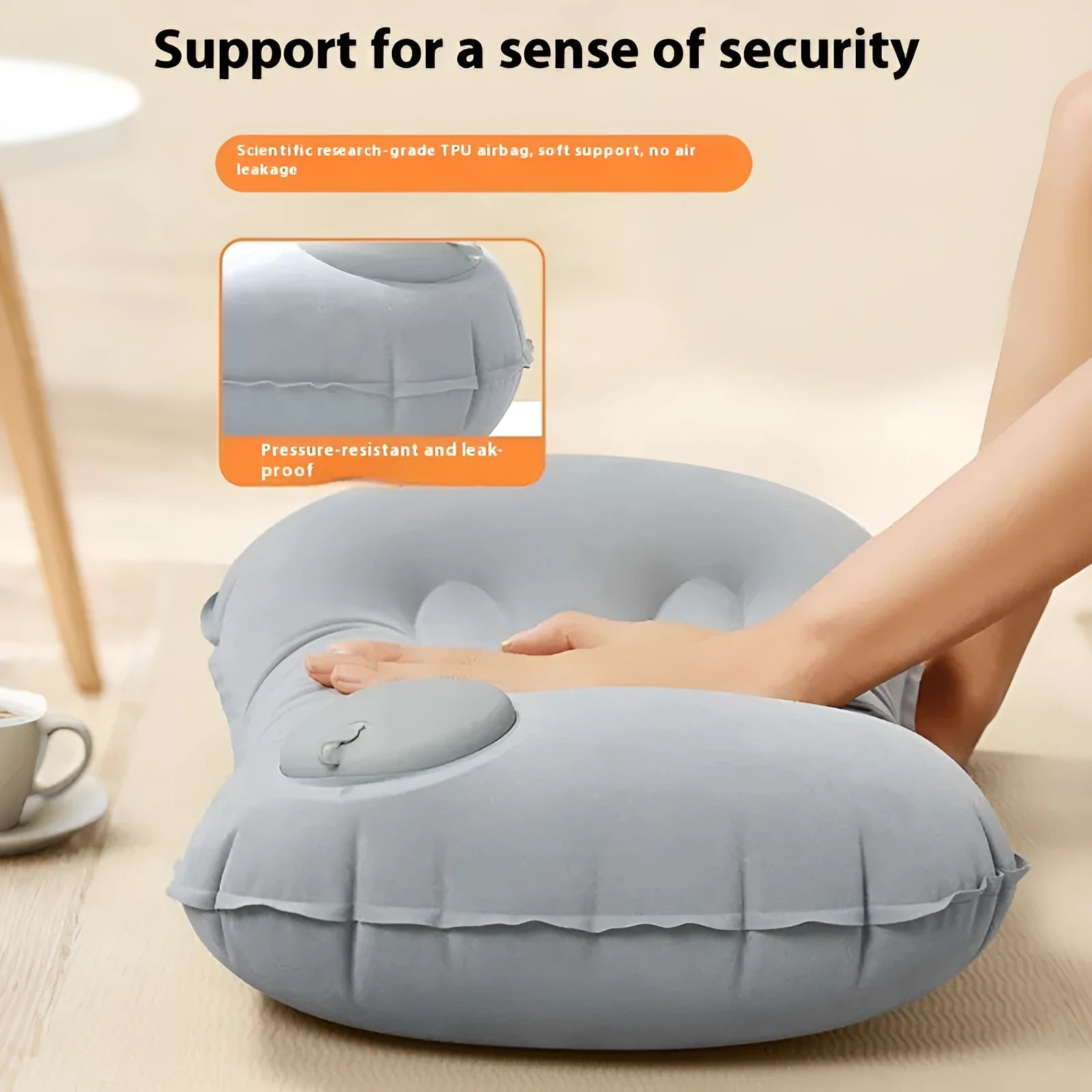 Grey inflatable travel pillow with flocking surface, shown deflated and inflated to 45x30x13cm size.