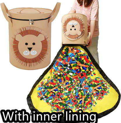 Green felt storage cube with pull rope unfolded into a large square play mat on a wooden floor.