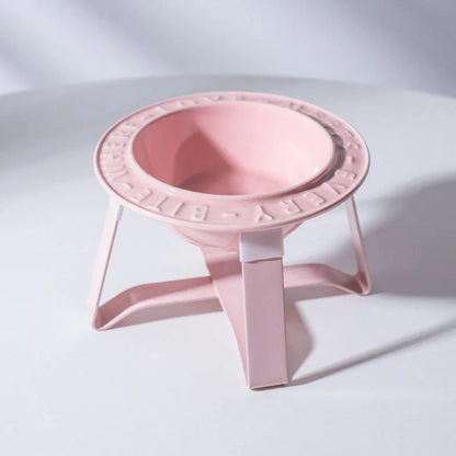 Ceramic cat bowl with iron anti-tip frame in blue colour with silicone pad