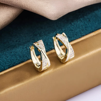 Geometric copper earrings with zircon detailing and 14K yellow gold finish