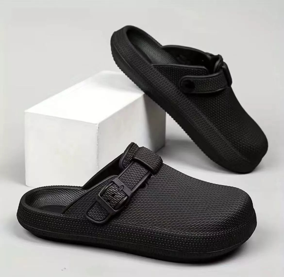 Lightweight EVA indoor home slippers in black, gray, and white