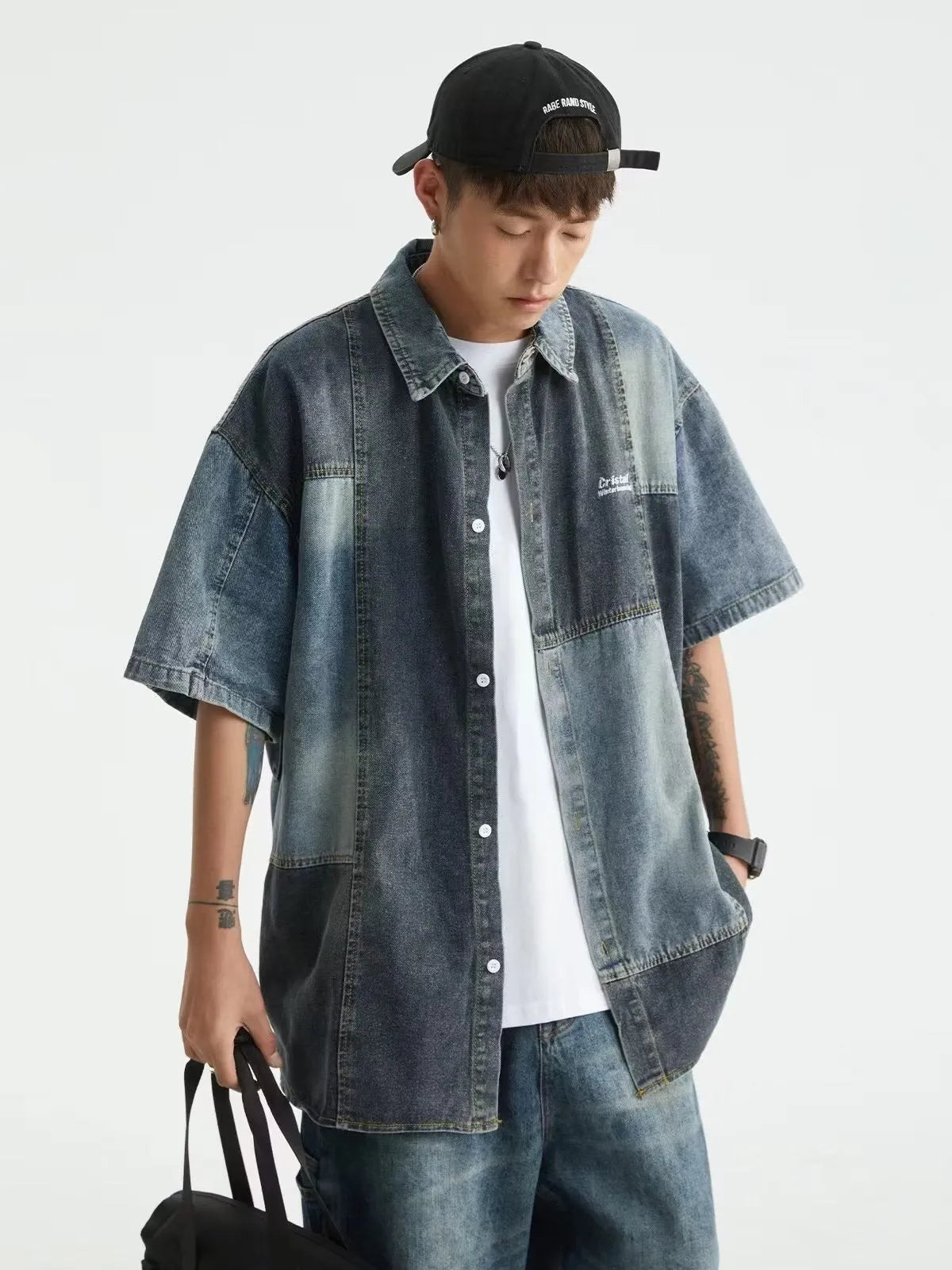 Blue Japanese-style loose fit denim cardigan shirt for men with retro washed finish.