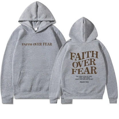A stylish Christian hoodie with inspirational graphics and a message of faith over fear