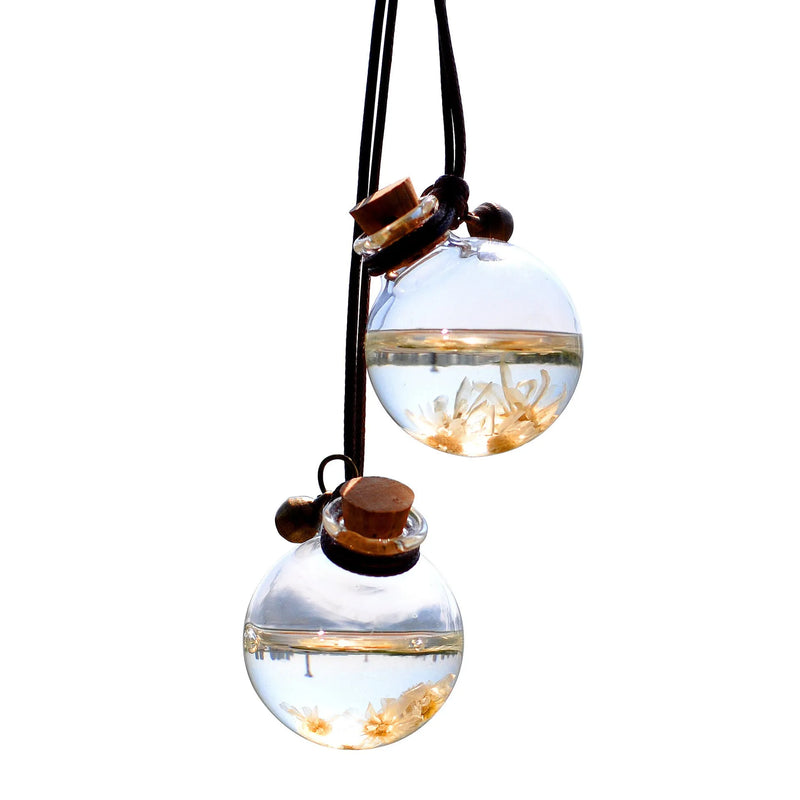 Car perfume bottle pendant with preserved flowers for interior decoration and aroma, available in 15 hydrangea and chrysanthemum colour variants, made from glass with a choice of 28mm or 35mm diameter fire extinguisher shape.