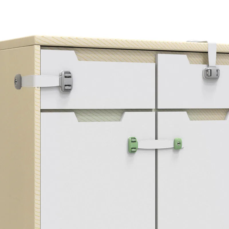 Grey adjustable child safety lock strap with 3M adhesive, shown securing a cabinet door.