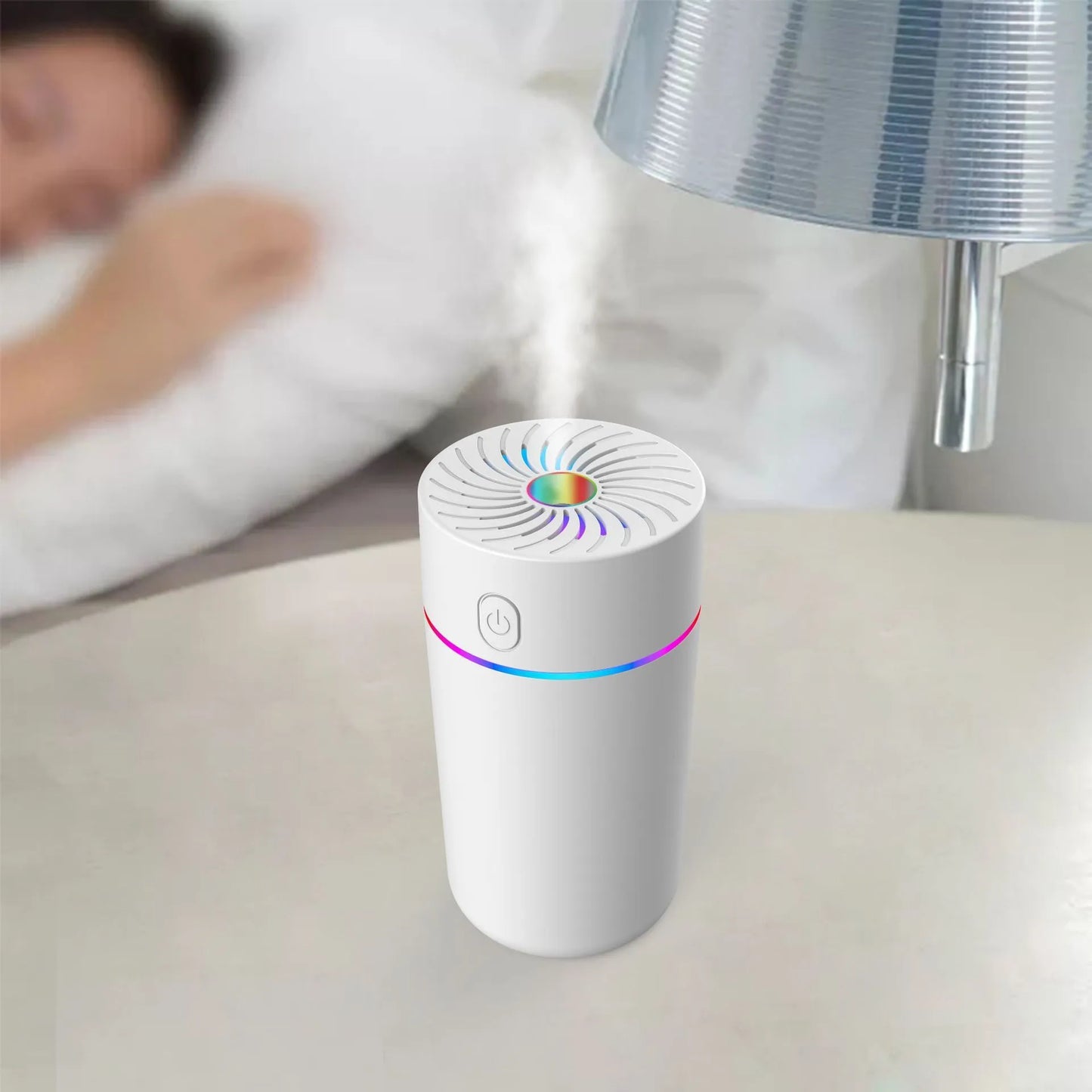 Compact car USB humidifier with aromatherapy function, showing plug-in and battery models in black and white colours