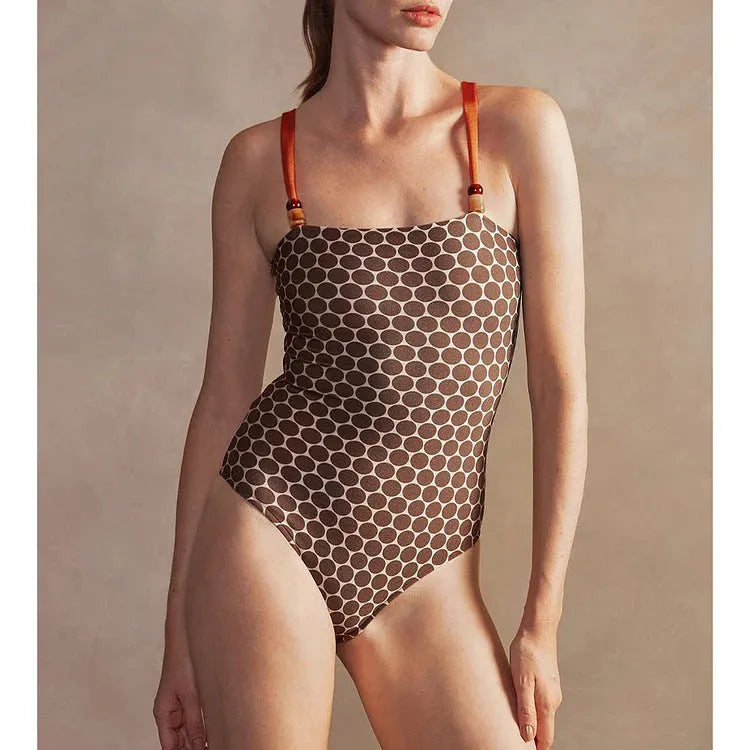 Women's one-piece swimsuit with wrap skirt in dots pattern design