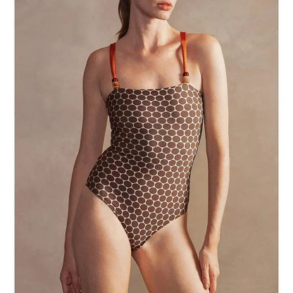 Women's one-piece swimsuit with wrap skirt in dots pattern design