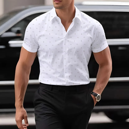 Man wearing a light blue short-sleeved floral print shirt with a casual cardigan style.