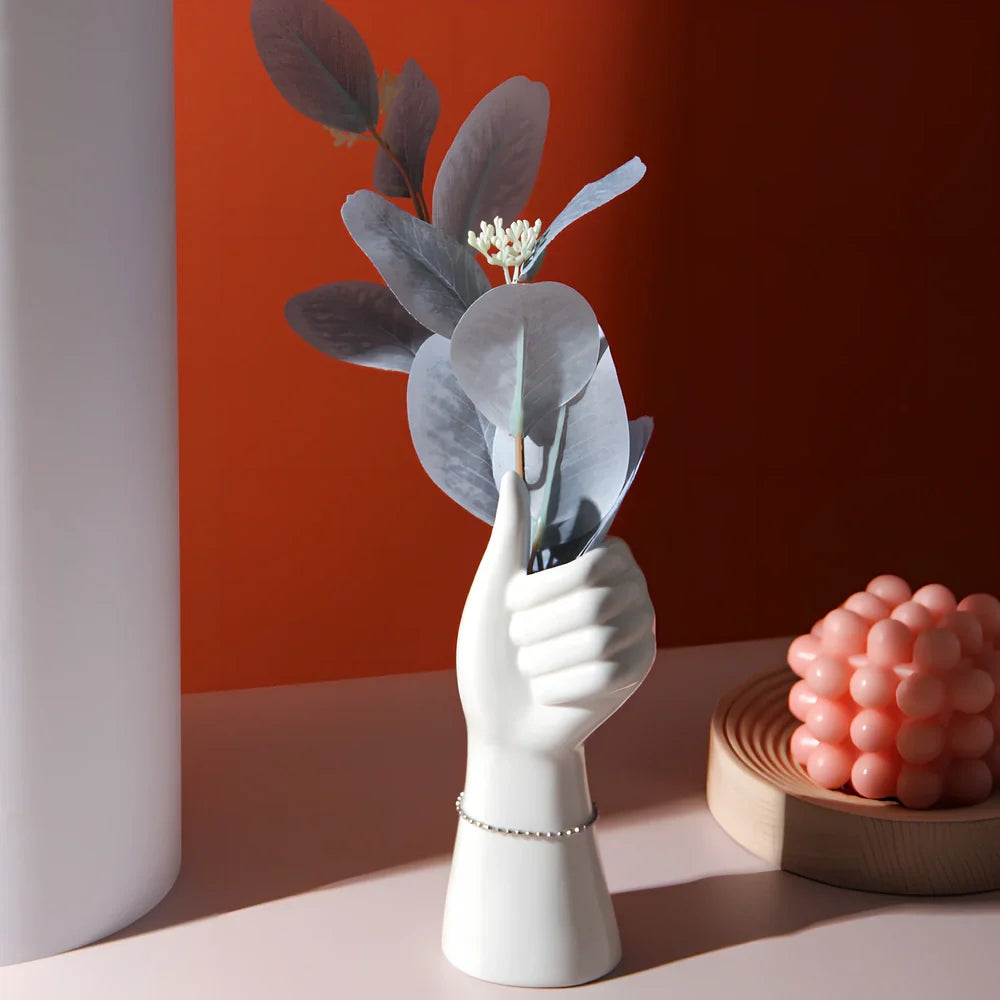 Ceramic human body vase with colour glaze finish showing decorative figures patterns, displayed as hanging ornament