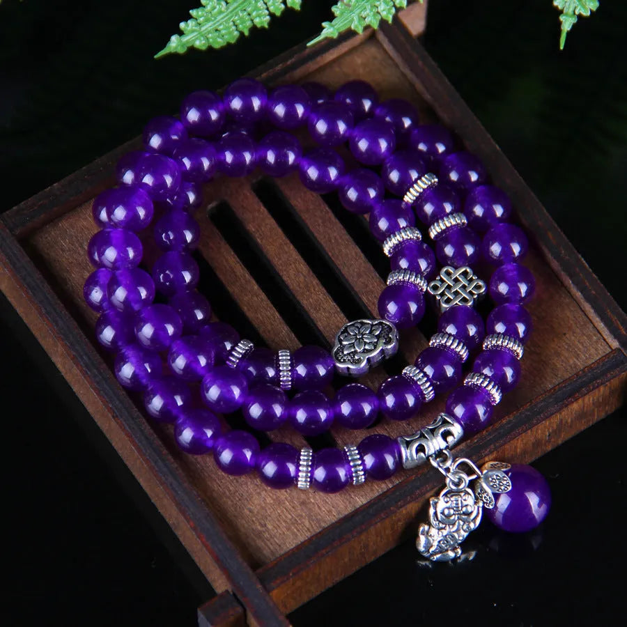 Purple chalcedony natural crystal bracelet with three-circle ethnic design on elastic cord