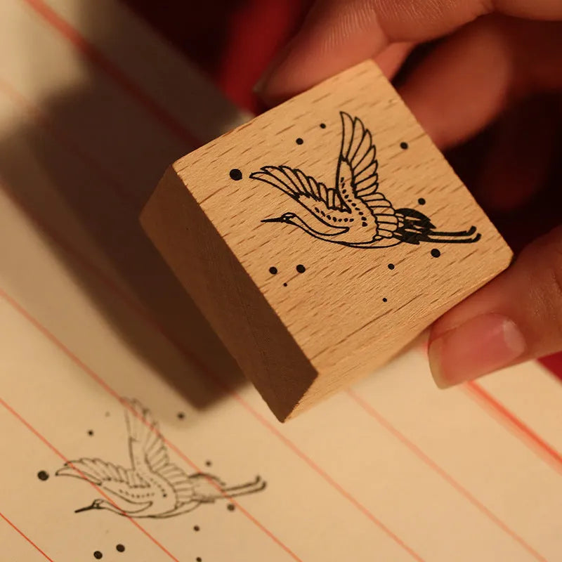 Mr. Paper wooden handle rubber stamp with crane design for DIY crafting.