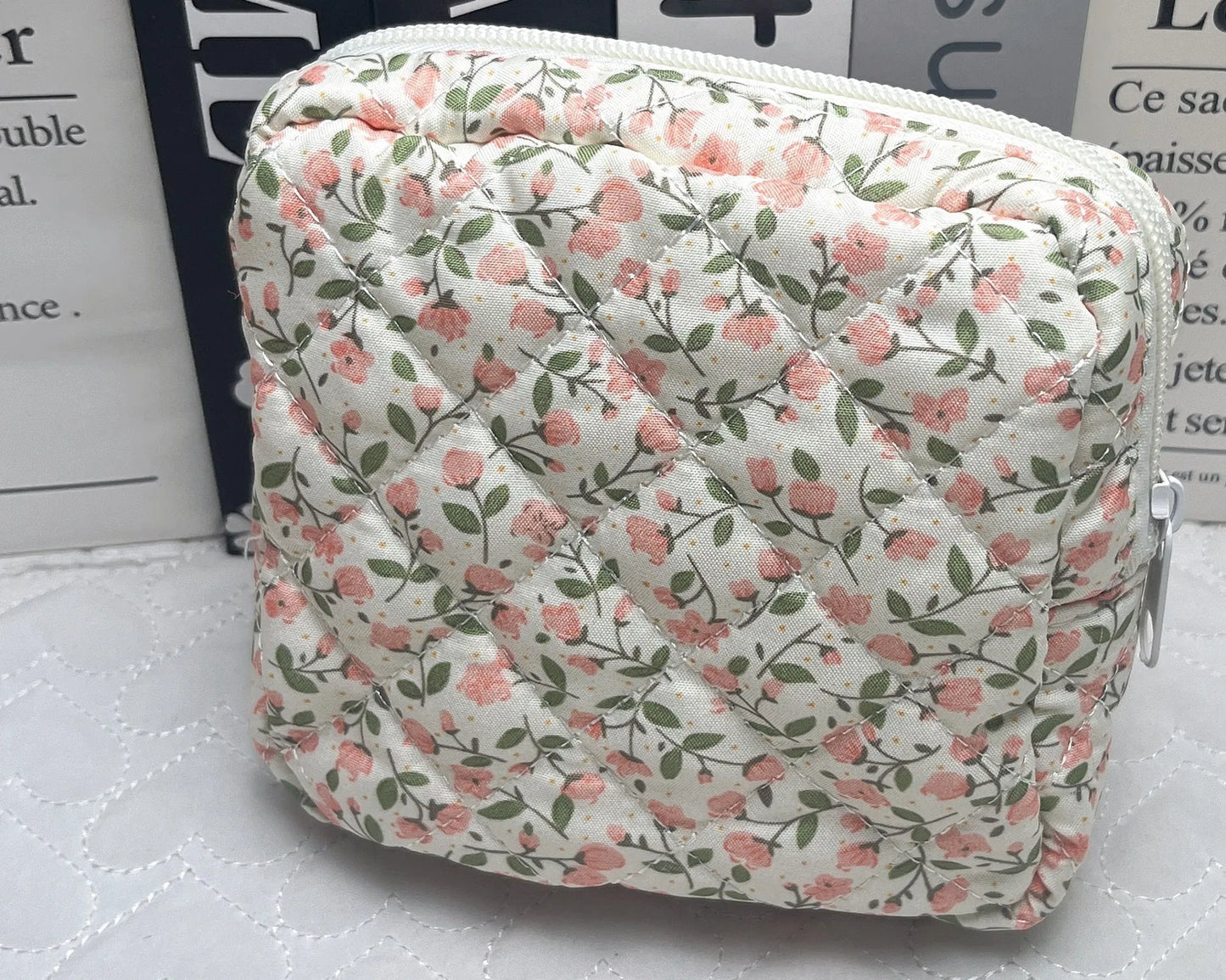 Women's key storage bag with floral patterns including cherry on white background design