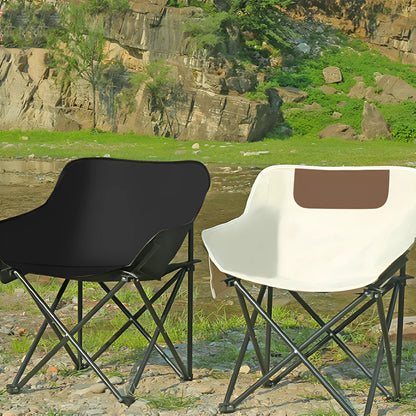 Portable folding camping chair with steel frame and Oxford fabric in outdoor setting