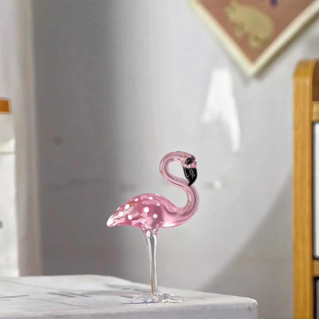 Pink crystal flamingo decorative ornament on table, 15cm tall with modern simplicity design