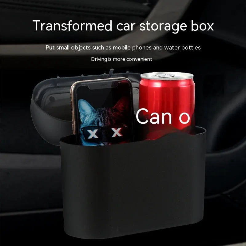 Black plastic folding car trash can mounted on vehicle seat back