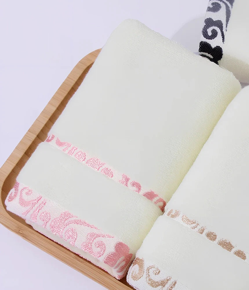 Pure cotton jacquard face towel measuring 33x73cm with textured patterns and twistless yarn construction