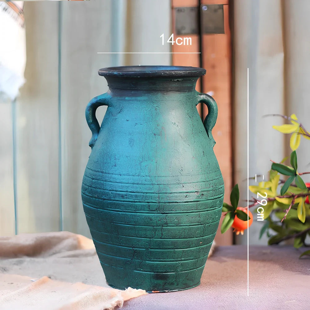 Ceramic mosaic vase with dried flowers, showing mosaic pattern and 25cm height