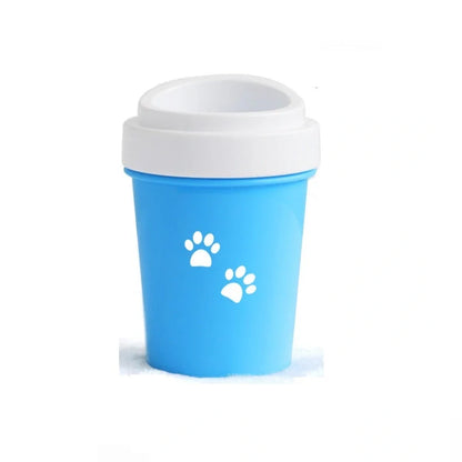 Silicone dog paw cleaner cup in blue, green, or pink with soft bristles for washing muddy paws