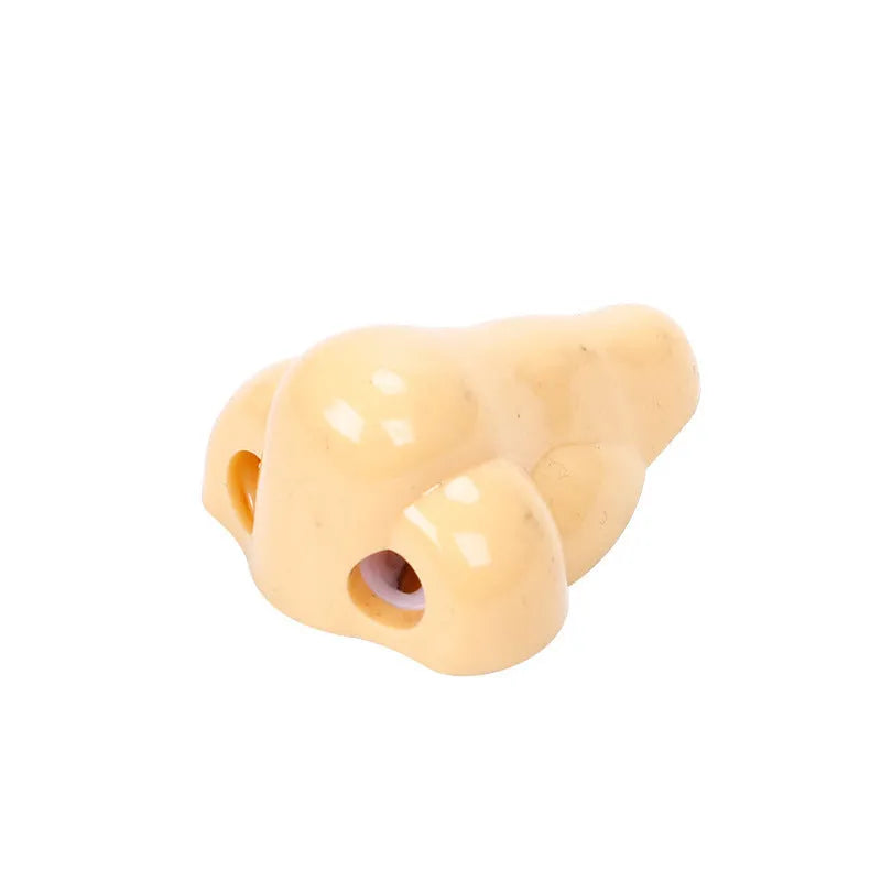Geometry-shaped plastic pencil sharpener measuring 58x45x30mm in flesh colour