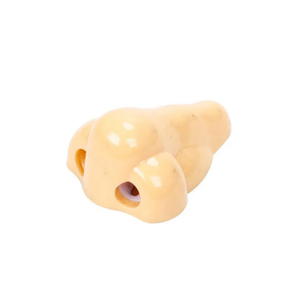 Geometry-shaped plastic pencil sharpener measuring 58x45x30mm in flesh colour