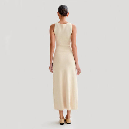 Elegant sleeveless knit dress in various colors, including almond and blue, with a slim, figure-flattering silhouette and round neckline