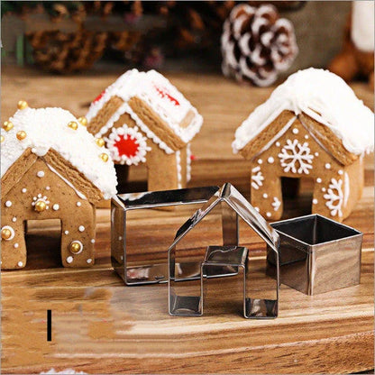 Stainless steel Christmas biscuit mold set featuring various festive shapes for holiday baking