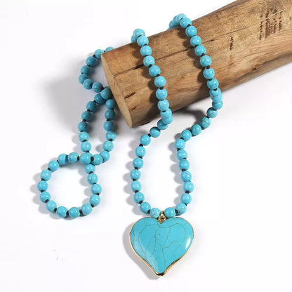 Handmade vintage ethnic style necklace with heart-shaped Mother Pearl pendant and turquoise beads