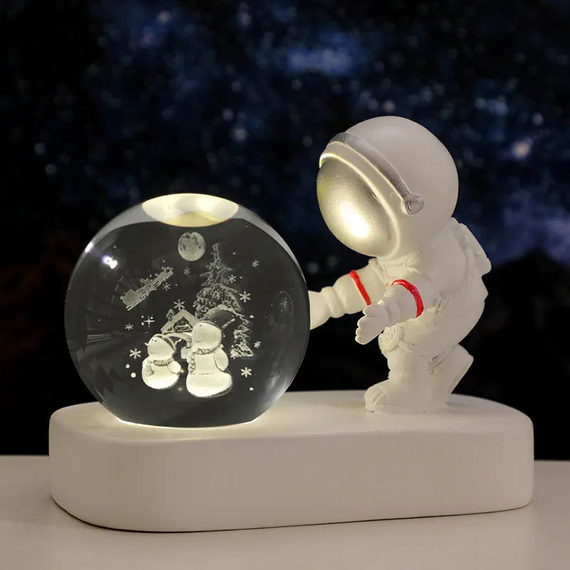 Astronaut crystal ball night light projecting galaxy pattern on 6cm resin sphere with USB cable