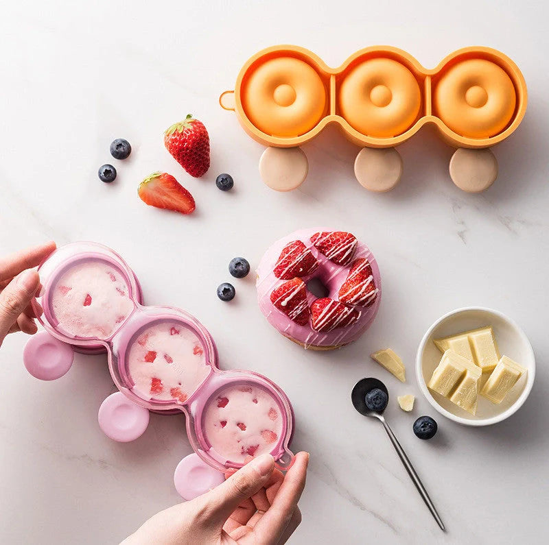Food grade silicone doughnut ice cream mold in yellow, green, and purple