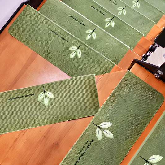 Self-adhesive luminous stair mat with glow strips on wooden staircase, rectangular design with hemmed edges