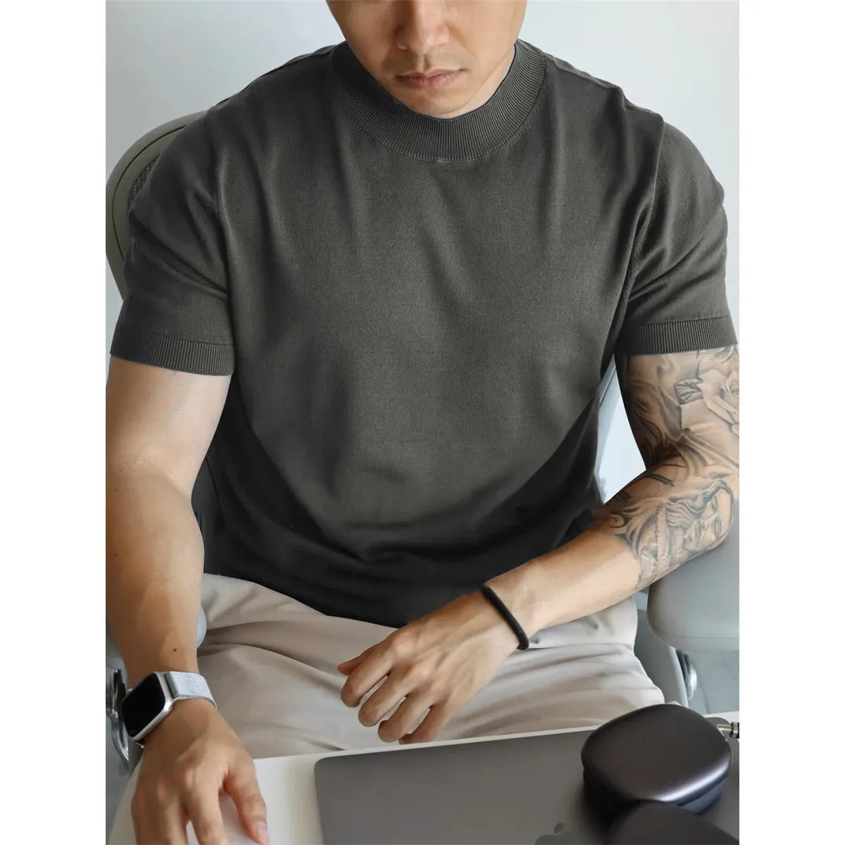 Men's slim-fit solid colour t-shirt in breathable polyester knitwear, shown in multiple colour options.
