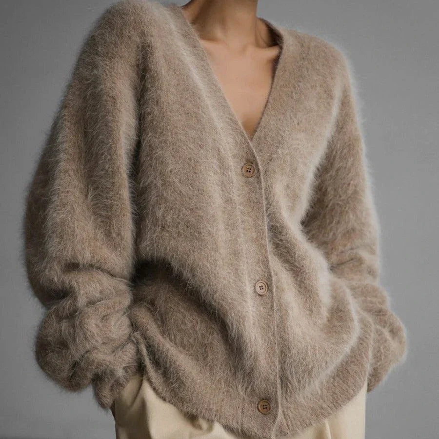 Cozy oversized cardigan with v-neck, button front, and variety of color options for women