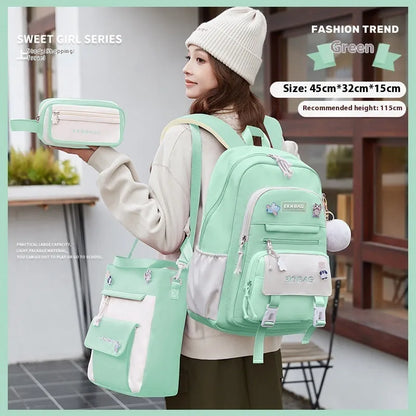 Pink waterproof Oxford cloth school backpack for girls with curved shoulder straps, shown with matching pencil case.