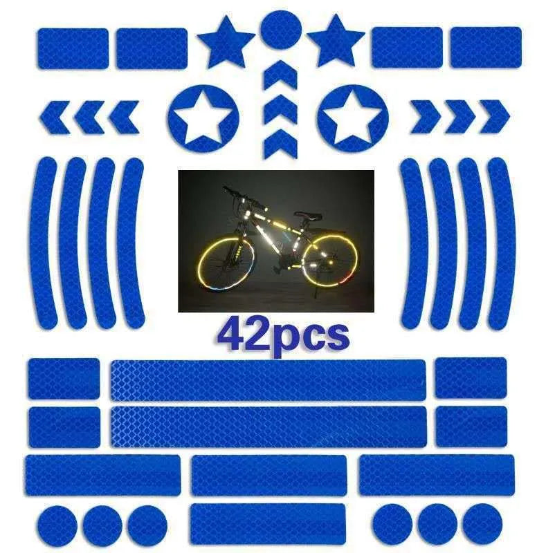 Geometric grid pattern reflective safety tape for bicycles in blue, red, white, and fluorescent yellow.