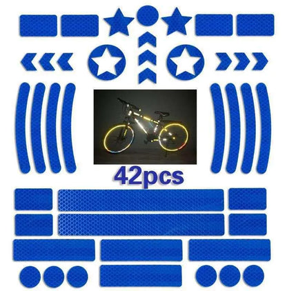 Geometric grid pattern reflective safety tape for bicycles in blue, red, white, and fluorescent yellow.
