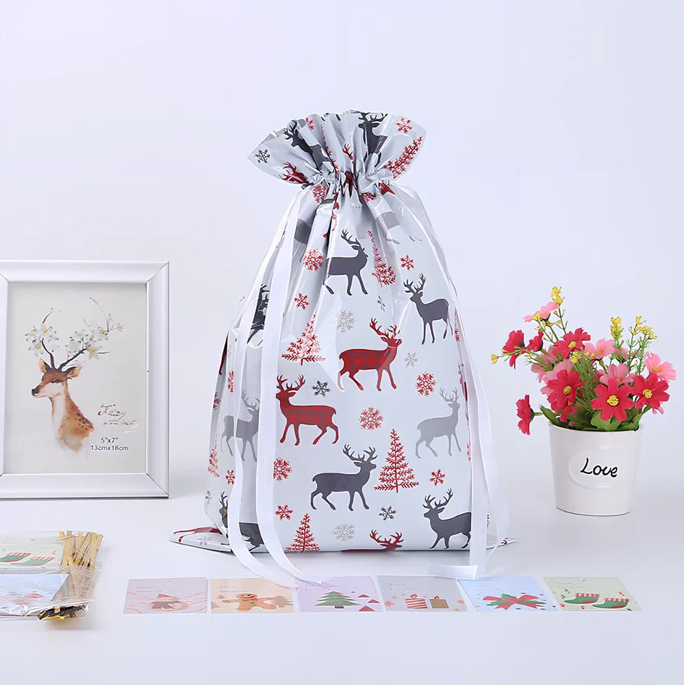 Christmas gift bag with drawstring closure in laser gold finish, 32x24cm dimensions