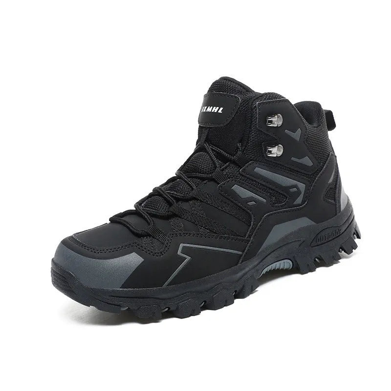 Low-top hiking sneaker in multiple colours on a rocky mountain path, showing lace-up front and rubber sole.