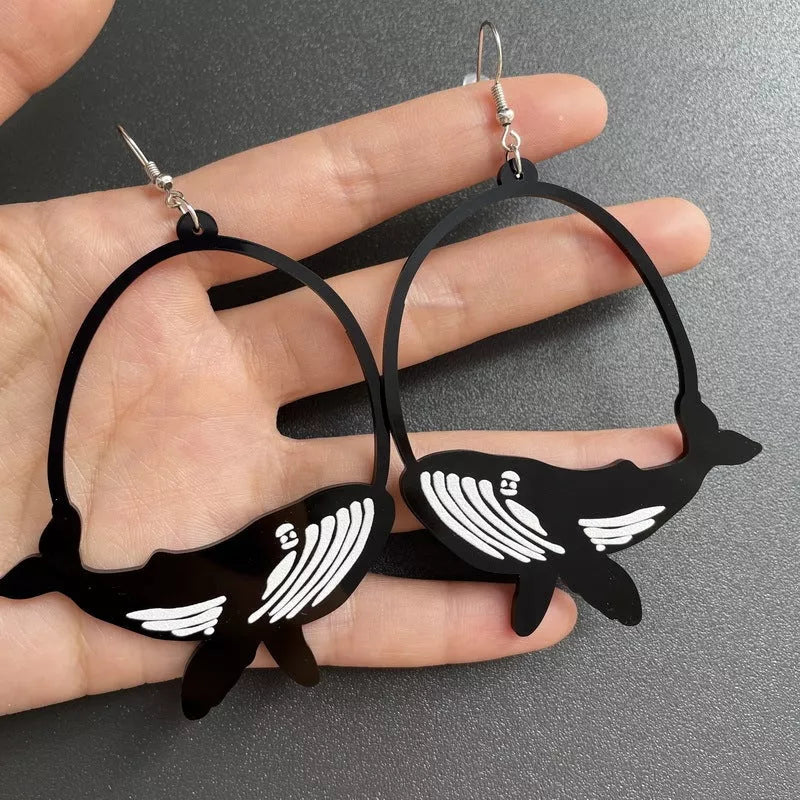 Black acrylic dangle earrings featuring unique animal and zodiac designs, lightweight and stylish.