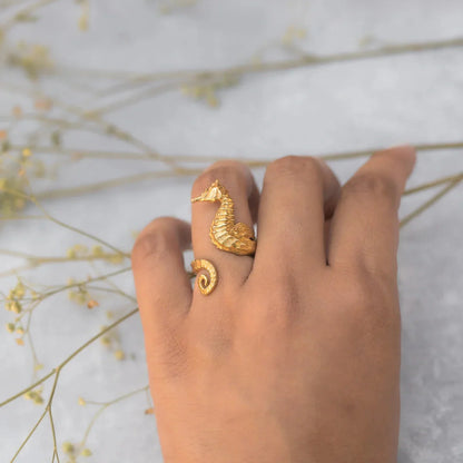 Shimmering 18K gold stainless steel cocktail ring with intricate seahorse design