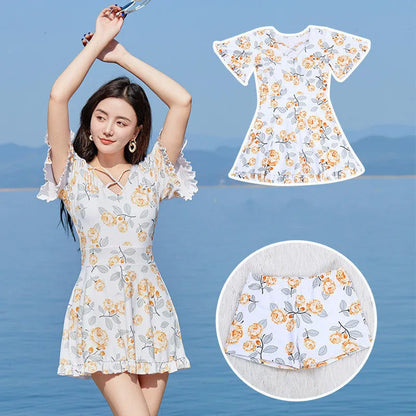 Women's high waist one-piece swimsuit with floral pattern in white flowers or blue design