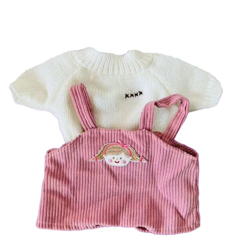 30cm doll clothing collection showing multiple outfit pieces including hooded jackets, sweaters, and suspender pants