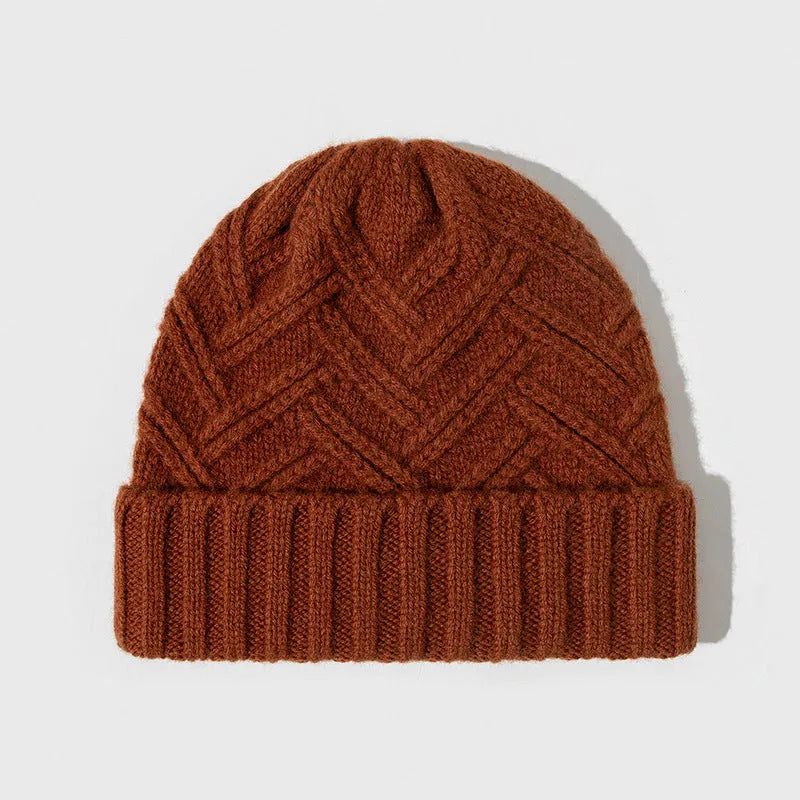 Wool knitted women's hat with dome crown in ankela red colour showing totem pattern details