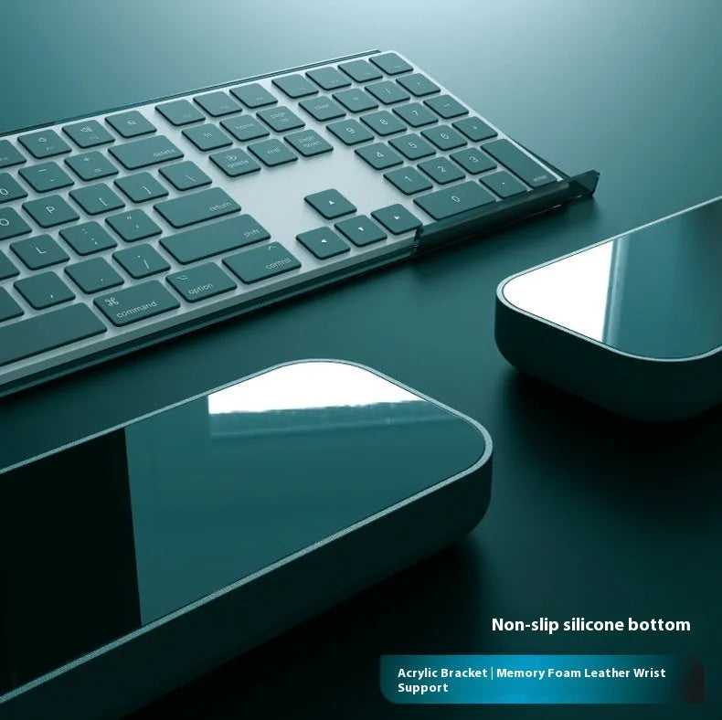 Double-sided memory foam keyboard and mouse desk pad set with gel wrist support pillow.